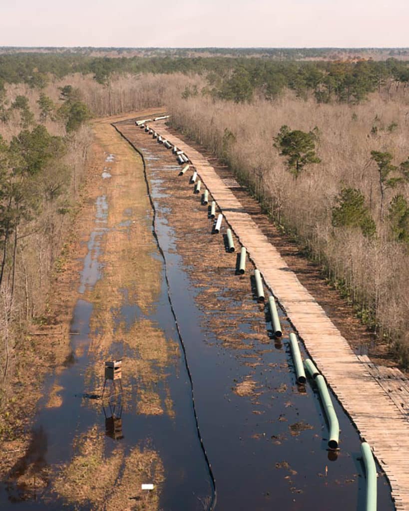 Totem Mats over swampy wetland area for pipeline project